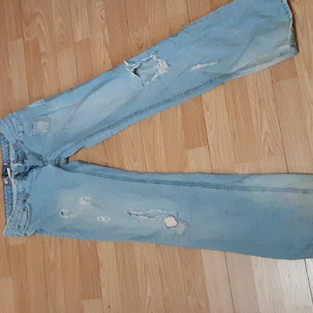 Duckhead distressed jeans with cherry on back pocket
